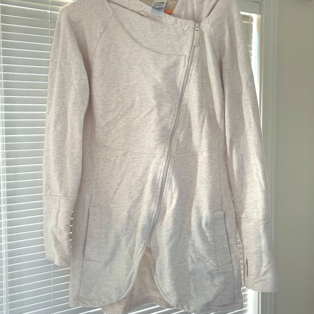 The North Face women’s long zip hoodie size large.